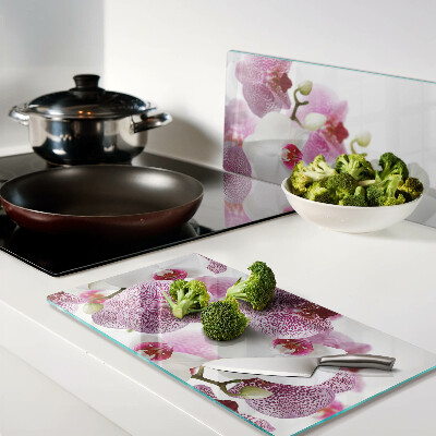 Tábua para corte Orquídeas ao fundo da janela