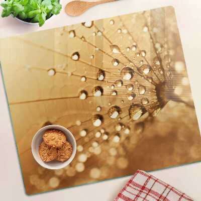 Tábua para cozinha Gotas de água em um dente-de-leão