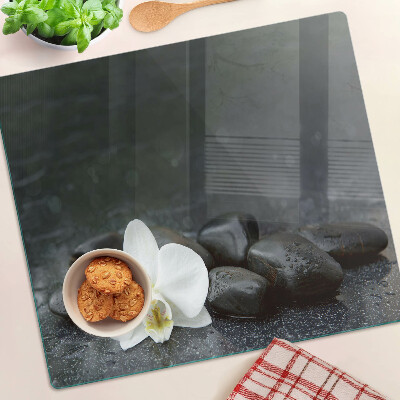 Tábua para corte Flor de orquídea em pedras