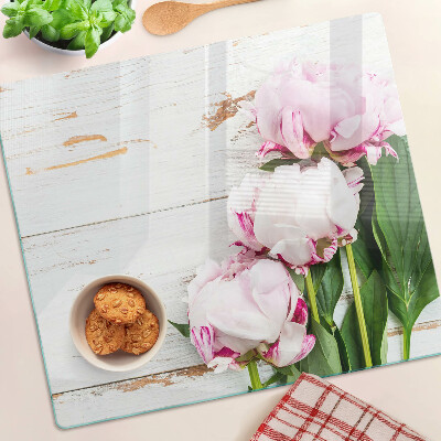 Tábua para cozinha Flores de peônia em um fundo de madeira