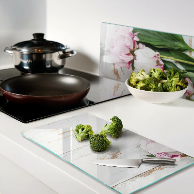 Tábua para cozinha Flores de peônia em um fundo de madeira