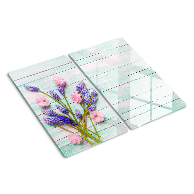 Tábua para cozinha Flores em um fundo de madeira