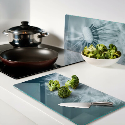 Tábua para corte Dente-de-leão contra o céu