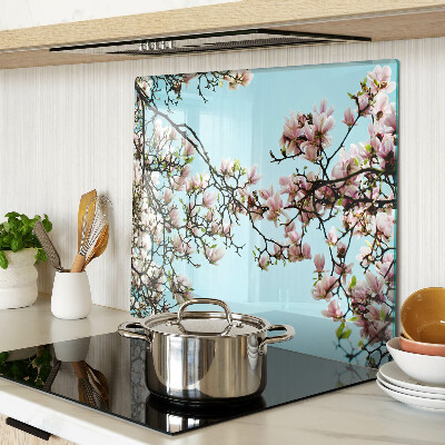 Tábua para cozinha Flores de magnólia em um fundo azul