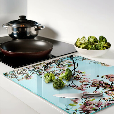 Tábua para cozinha Flores de magnólia em um fundo azul