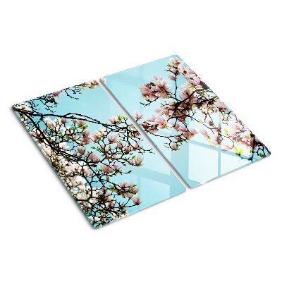Tábua para cozinha Flores de magnólia em um fundo azul