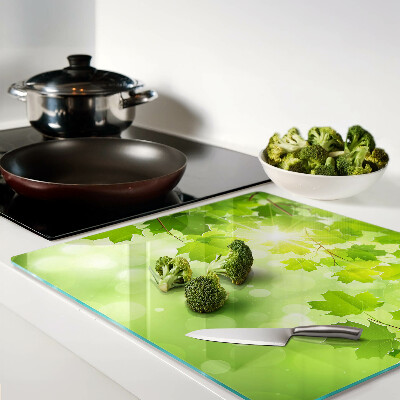 Tábua para corte Folhas sob os raios do sol