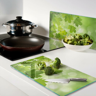 Tábua para corte Folhas sob os raios do sol