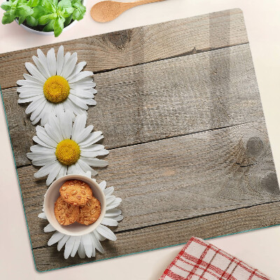 Tábua para cozinha Flores em um fundo de madeira