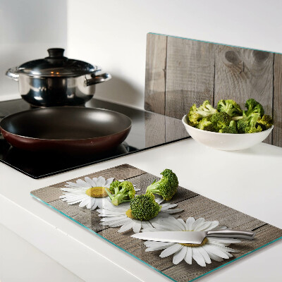 Tábua para cozinha Flores em um fundo de madeira