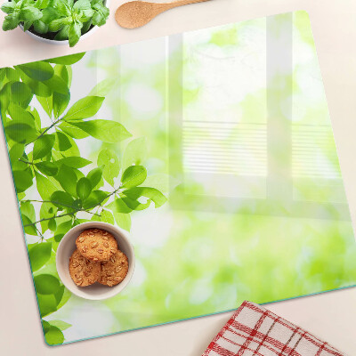 Tábua para corte Folhas verdes na luz