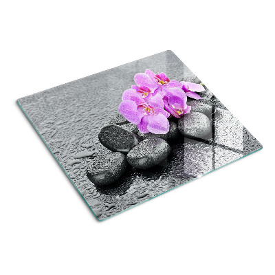 Tábua para cozinha Flores e pedras contra o fundo da água