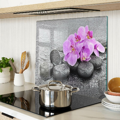 Tábua para cozinha Flores e pedras contra o fundo da água