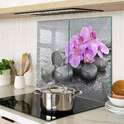Tábua para cozinha Flores e pedras contra o fundo da água
