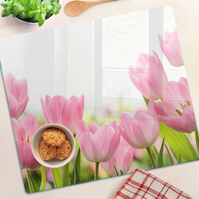 Tábua para corte Tulipas cor de rosa no jardim