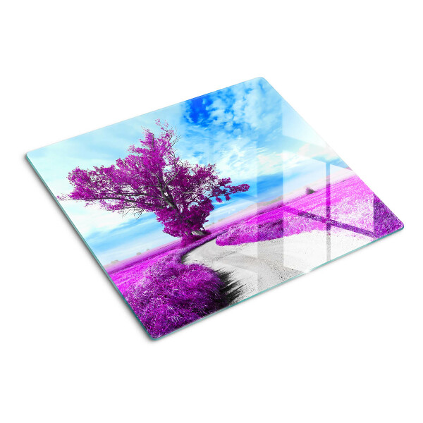 Tábua para corte Uma árvore roxa contra o céu