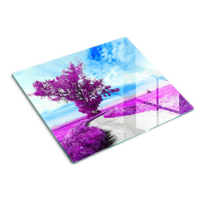 Tábua para corte Uma árvore roxa contra o céu