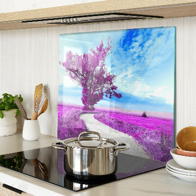 Tábua para corte Uma árvore roxa contra o céu