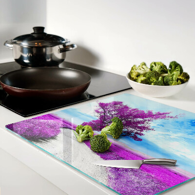 Tábua para corte Uma árvore roxa contra o céu