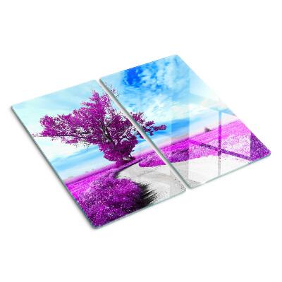 Tábua para corte Uma árvore roxa contra o céu