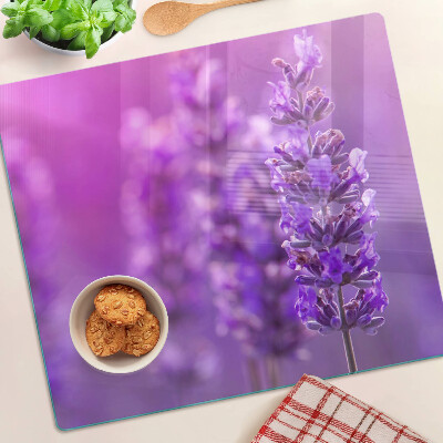 Tábua para corte Flores de lavanda em um fundo roxo