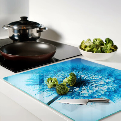 Tábua para corte Dente-de-leão em fundo azul