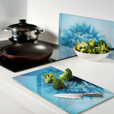 Tábua para corte Dente-de-leão em fundo azul