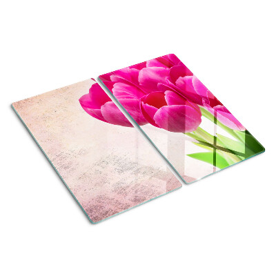 Tábua para corte Flores de tulipa em um fundo rosa