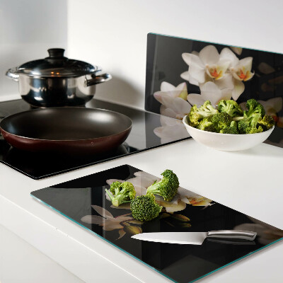 Tábua para corte Orquídeas em fundo preto