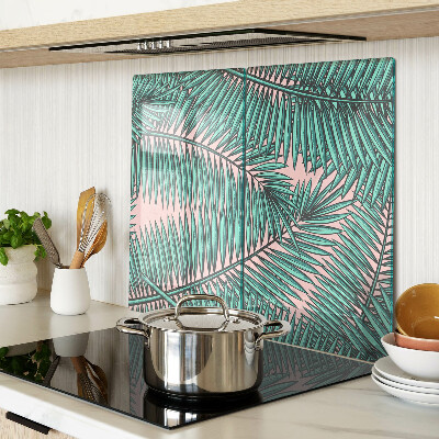 Tábua para cozinha Folhas de palmeira em um fundo rosa