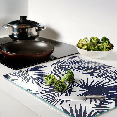 Tábua para corte Folhas de palmeira em um fundo branco