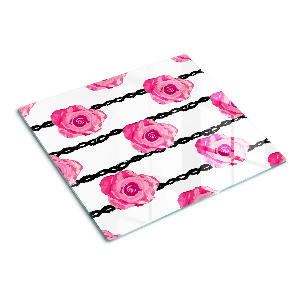 Tábua para corte Rosas em um fundo de linha preta