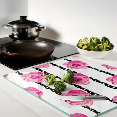 Tábua para corte Rosas em um fundo de linha preta