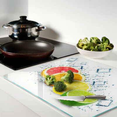 Tábua para corte Frutas cítricas em fatias coloridas