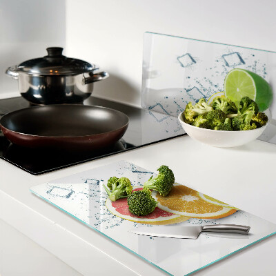 Tábua para corte Frutas cítricas em fatias coloridas