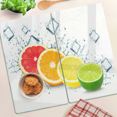 Tábua para corte Frutas cítricas em fatias coloridas