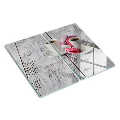 Tábua para cozinha Café e macarons em um fundo de madeira