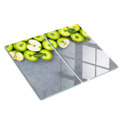 Tábua para cozinha Maçãs verdes em uma superfície cinza