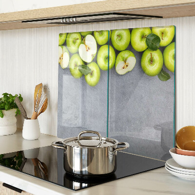 Tábua para cozinha Maçãs verdes em uma superfície cinza