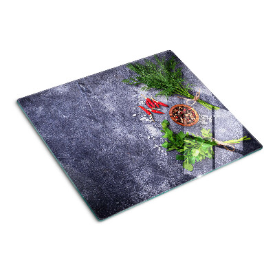 Tábua para corte Ervas e especiarias em um fundo de pedra