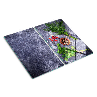 Tábua para corte Ervas e especiarias em um fundo de pedra