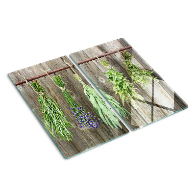 Tábua para cozinha Ervas em um fundo de madeira