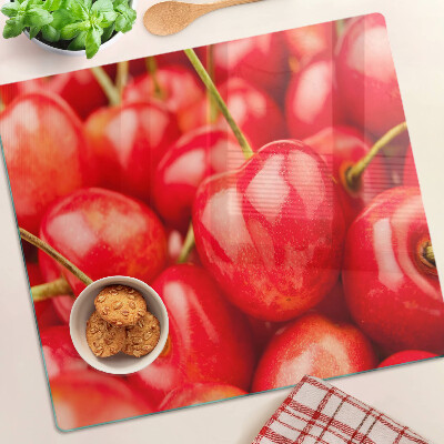 Tábua para corte Cerejas em fundo vermelho