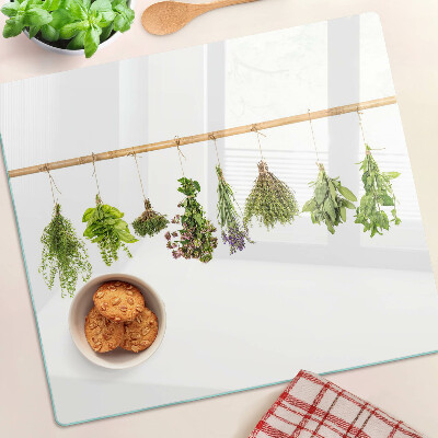 Tábua para cozinha Ervas secas em um barbante