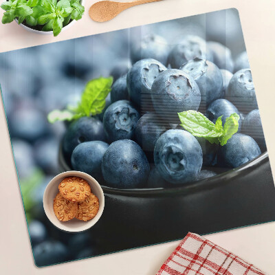 Tábua para corte Frutas vermelhas em uma tigela
