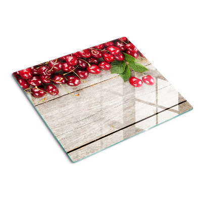 Tábua para cozinha Cerejas em um fundo de madeira