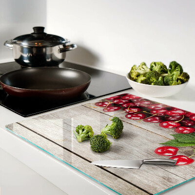 Tábua para cozinha Cerejas em um fundo de madeira