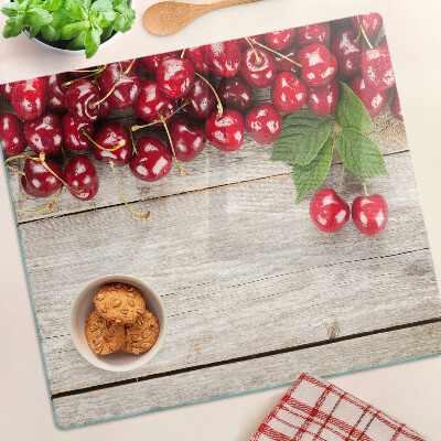 Tábua para cozinha Cerejas em um fundo de madeira