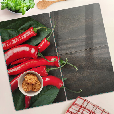 Tábua para cozinha Pimentas em um fundo de madeira
