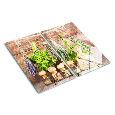 Tábua para corte Ervas e especiarias em um fundo de madeira